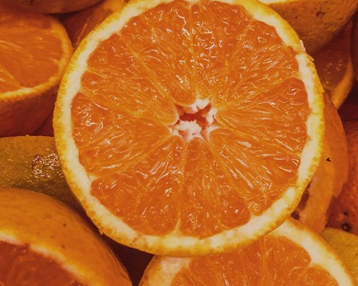 Photograph of cut oranges